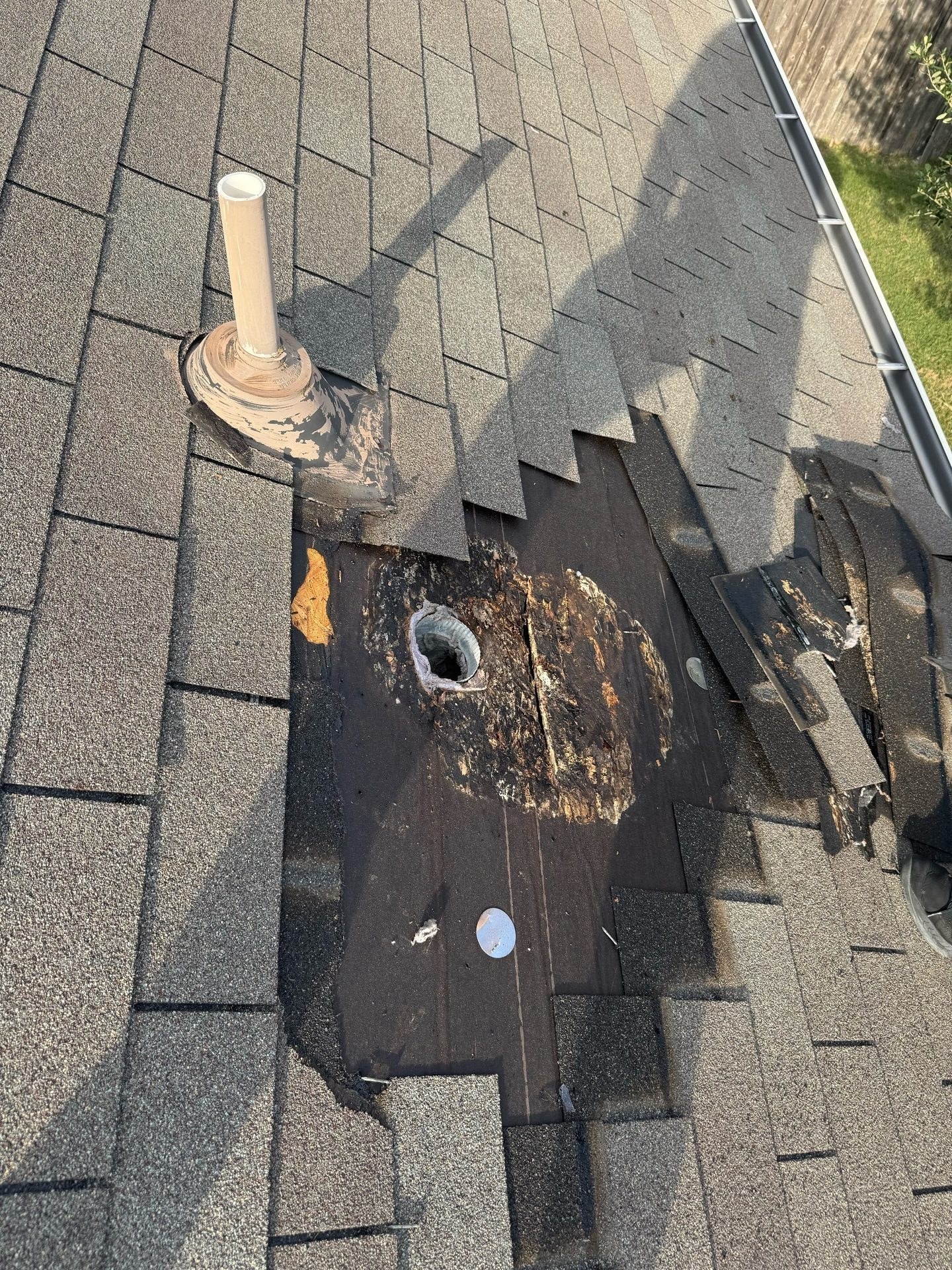 Home repair before: rot at vent